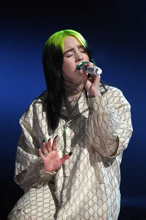 Billie Eilish displays figure for first time as she strips off in ...